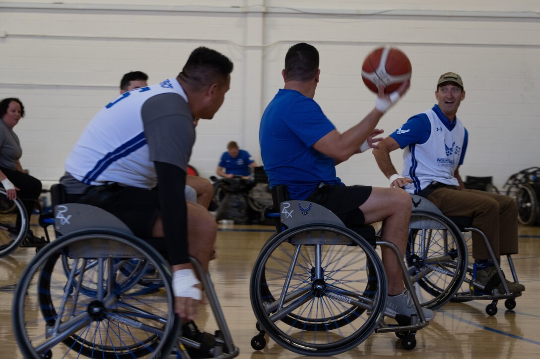 U.S. Air Force Wounded Warrior athletes and volunteers play competitive wheelchair basketball during the 2023 Warrior CARE Week at Joint Base Andrews