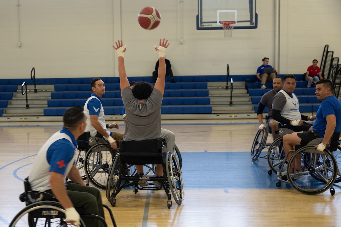 U.S. Air Force Wounded Warrior athletes and volunteers play competitive wheelchair basketball at Joint Base Andrews