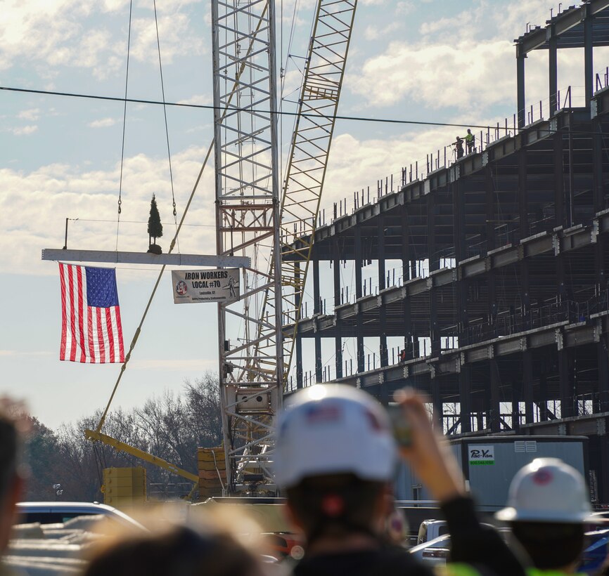 The final steel beam for the Louisville VA Medical Center is hoisted into place Nov. 30, 2023 – symbolizing the completion of steel placement.