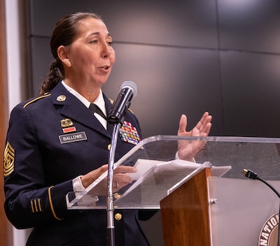 Command Sgt. Maj. Dena Ballowe (left), Senior Enlisted Leader of the Illinois National Guard speaks to the Airman of the Year 2021 (OAY 21) nominees during the OAY21 Award Ceremony at Joint Force Headquarters, Camp Lincoln, Springfield, Illinois Jan. 8, 2022. Ballowe retired Oct. 31 after 32 years of service in the Illinois Army National Guard.