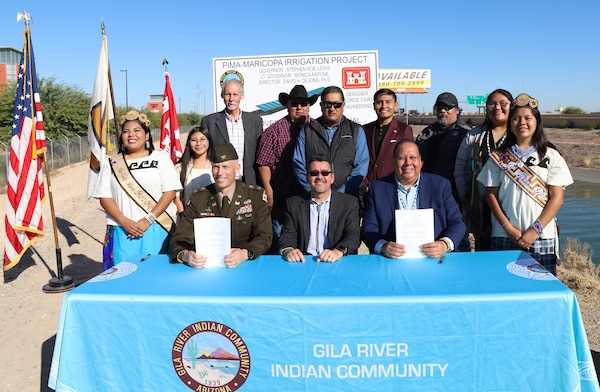 Assistant Secretary of the Army for Civil Works Michael Connor, center, along with leaders and representatives from the Gila River Indian Community, and the U.S. Army Corps of Engineers Los Angeles District, pose for a picture after signing a project partnership agreement Nov. 9 at the Gila River Indian Reservation in Arizona. The agreement represents the first solar-over-canal project of its kind in the United States.