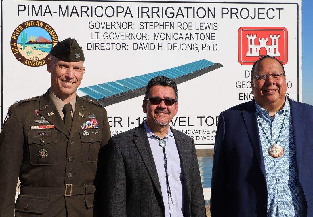 U.S. Army Corps of Engineers Los Angeles District Commander Col. Andrew Baker, Assistant Secretary of the Army for Civil Works Michael Connor, and Gila River Indian Community Governor Stephen Roe Lewis pose for a picture after signing a project partnership agreement Nov. 9 at the Gila River Indian Reservation in Arizona. The Gila River Indian Community and the U.S. Army Corps of Engineers signed a project partnership agreement to begin construction on Phase I of the Pima-Maricopa Irrigation Project Renewal Energy Pilot Project.  This agreement starts the first phase of the solar-over-canal project within the Community and will involve construction of solar panels over a portion of the Community’s canal to conserve water and generate renewable energy for tribal irrigation facilities.