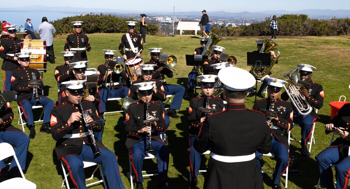 Marine Band San Diego performs pre-ceremonial music under the direction of the enlisted conductor, Staff Sgt. Nathan Casey, for the annual Mt. Soledad Veteran’s Day Ceremony, La Jolla, California, Nov. 11, 2023. This year, Mt. Soledad’s National Veterans Memorial commemorated the 50th anniversary of the Vietnam War. Marine bands showcase the Esprit de Corps through music and represent the discipline and professionalism of the Marine Corps. Casey is a native of Portland, Oregon. (U.S. Marine Corps photo by Staff Sgt. Melissa L. Karnath)
