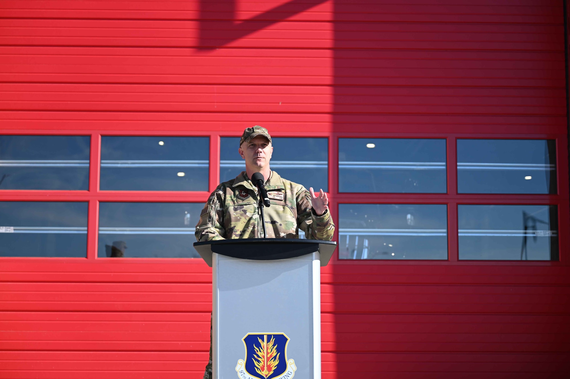 U.S. Air Force Col. Jeff Marshall, 97th Air Mobility Wing (AMW) commander, gives a speech at the opening of the 97th Civil Engineer Squadron’s headquarters fire station at Altus Air Force Base, Oklahoma, Dec. 1, 2023. Marshall is the ninth 97th AMW commander to oversee the new fire station project. (U.S Air Force photo by Airman 1st Class Kari Degraffenreed)