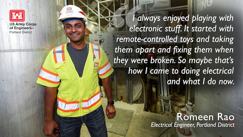 A man stands inside of an electrical room in a U.S. Army Corps of Engineers hard hat with a reflective safety vest on. Text appears on the right side of the image. "I always enjoyed playing with electronic stuff. It started with remote-controlled toys and taking them apart and fixing them when they were broken. So maybe that's how I came to doing electrical and what I do now.