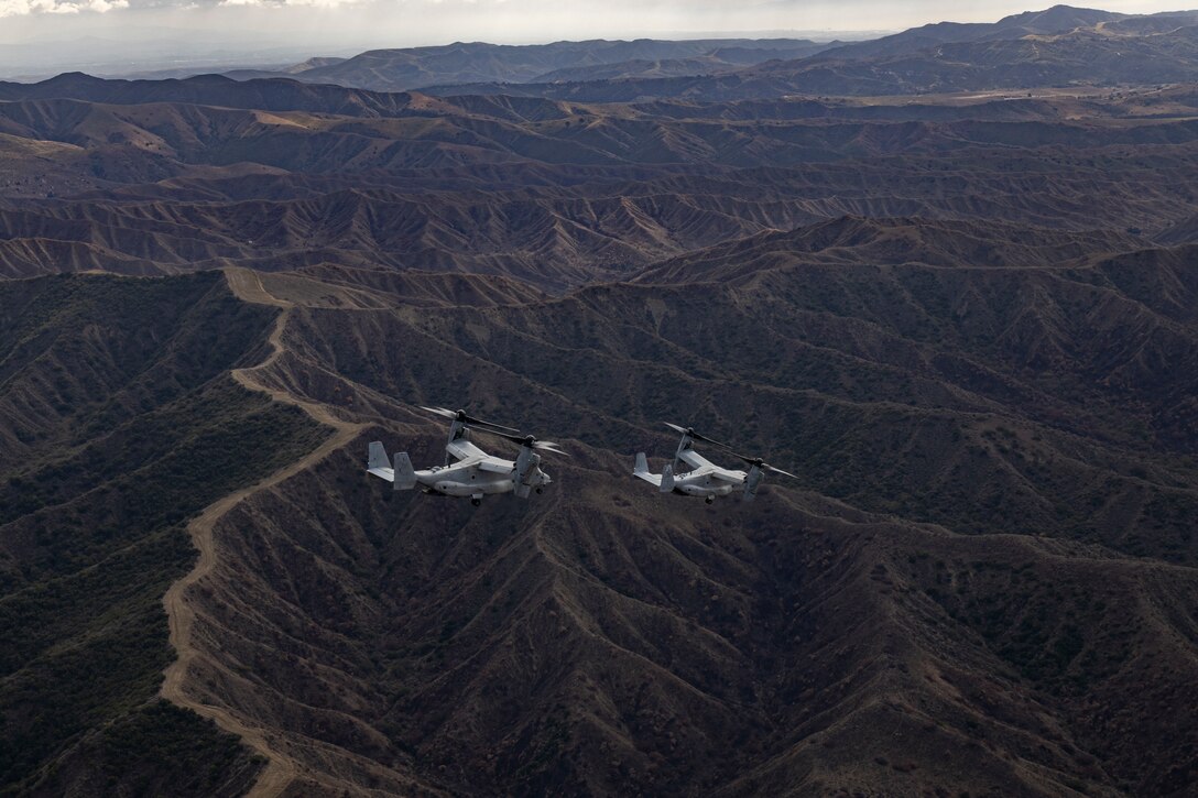 U.S. Marine Corps MV-22B Osprey aircraft with Marine Medium Tiltrotor Squadron (VMM) 164, Marine Aircraft Group 39, 3rd Marine Aircraft Wing, conduct embassy reinforcement training in support of Exercise Steel Knight 23.2 at Marine Corps Base Camp Pendleton, California, Nov. 29, 2023. Marines and aircraft with MAG-39 conducted aerial support for embassy reinforcement training with Marine Rotational Force-Darwin. Steel Knight 23.2 is a three-phase exercise designed to train I Marine Expeditionary Force in the planning, deployment and command and control of a joint force against a peer or near-peer adversary combat force and enhance existing live-fire and maneuver capabilities of the Marine Air-Ground Task Force. (U.S. Marine Corps photo by Sgt.  Potter)
