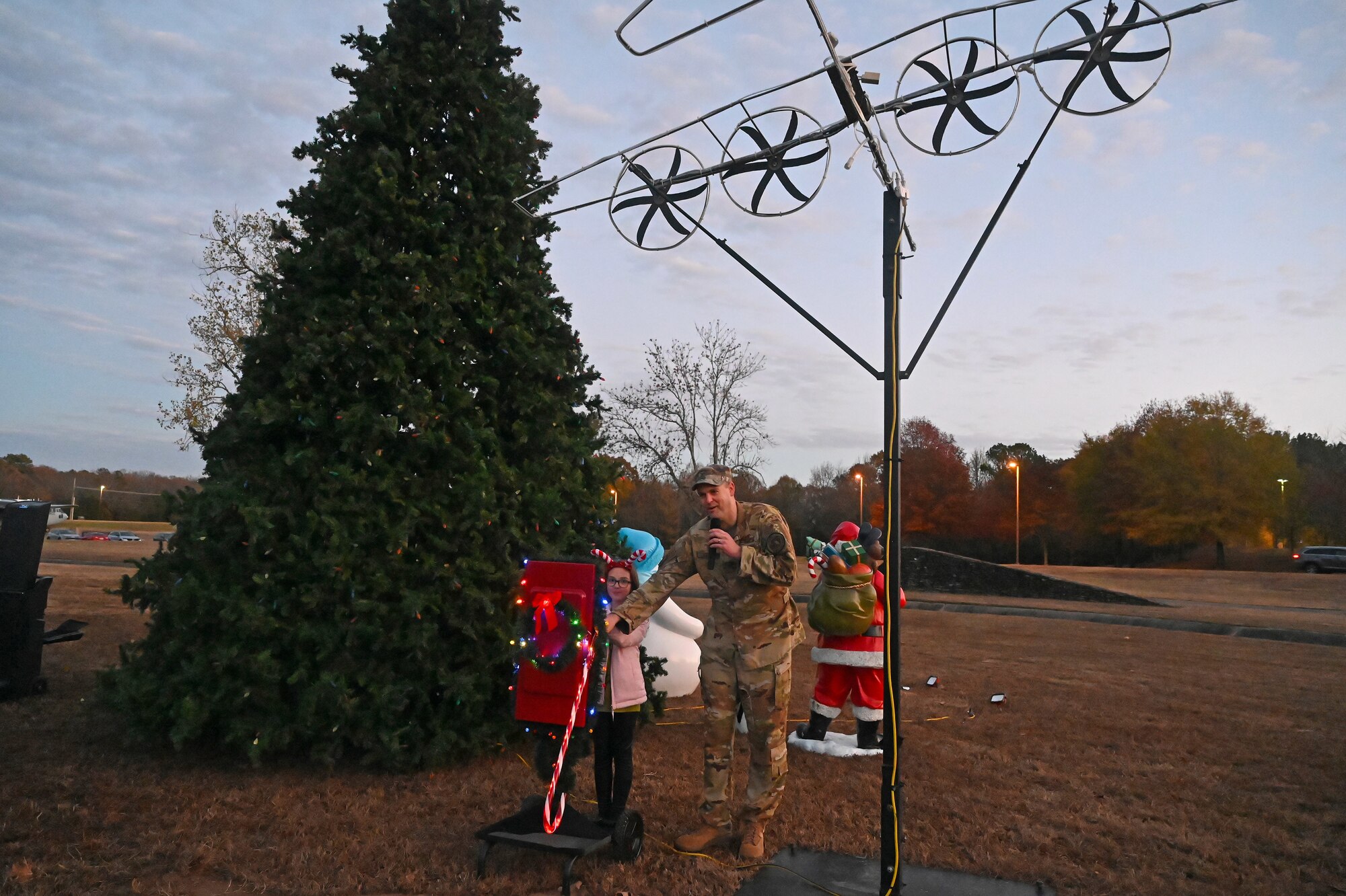Families enjoy the Holiday Tree lighting ceremony in Heritage Park