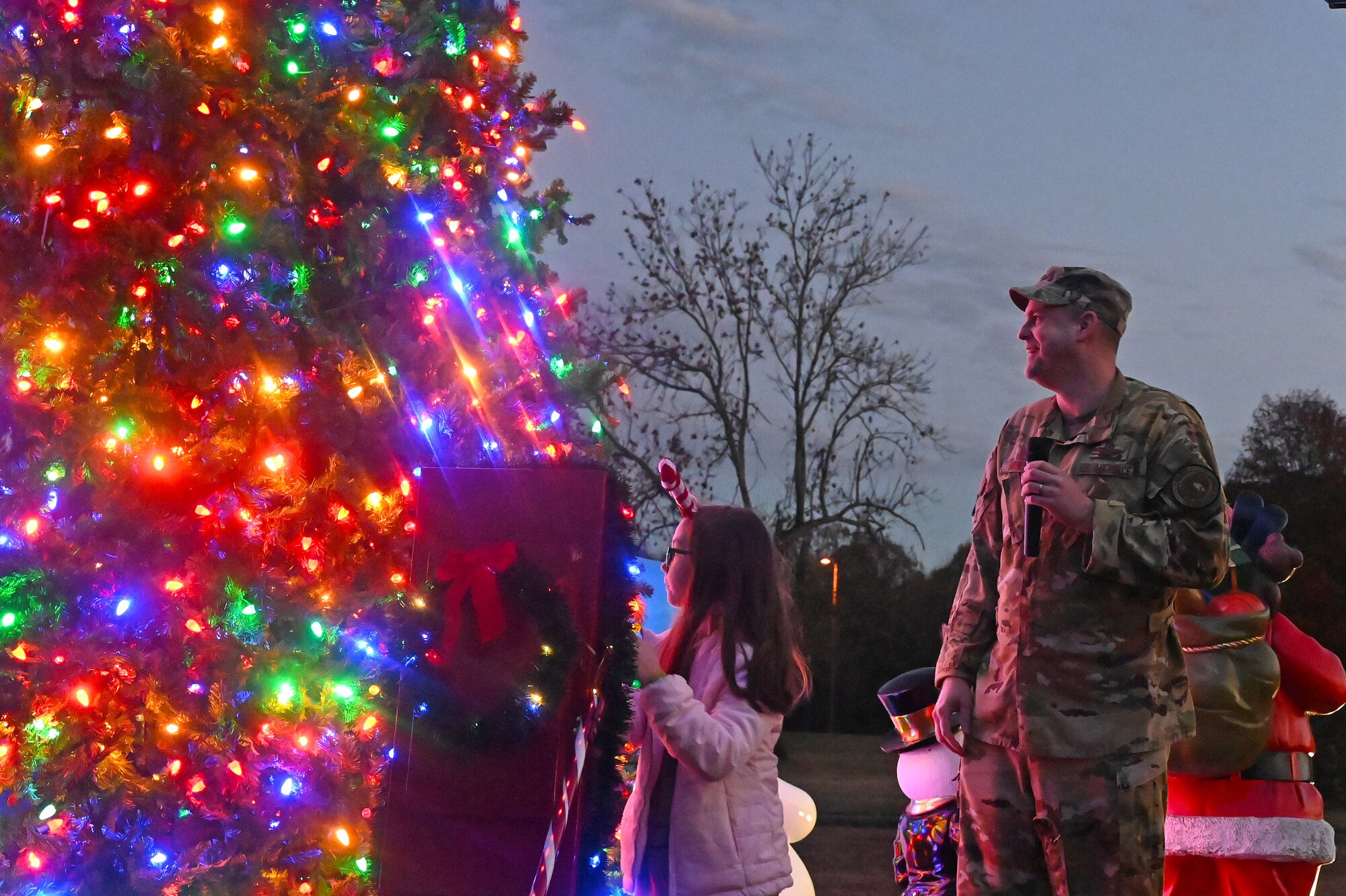 Families enjoy the Holiday Tree lighting ceremony in Heritage Park