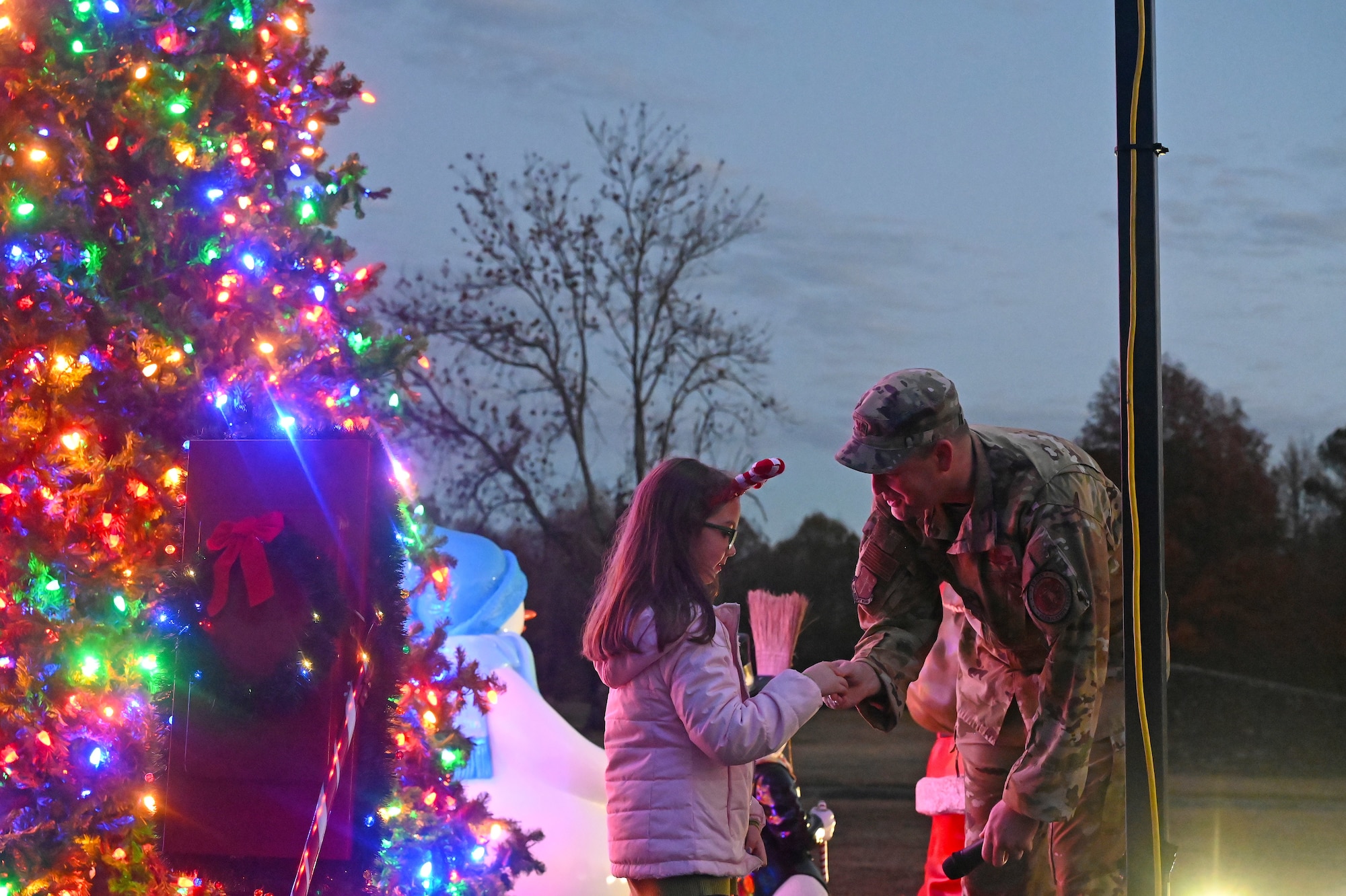 Families enjoy the Holiday Tree lighting ceremony in Heritage Park