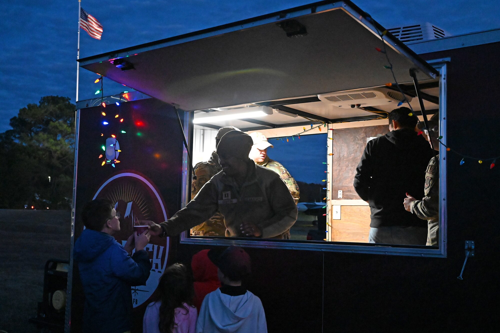 Families enjoy the Holiday Tree lighting ceremony in Heritage Park