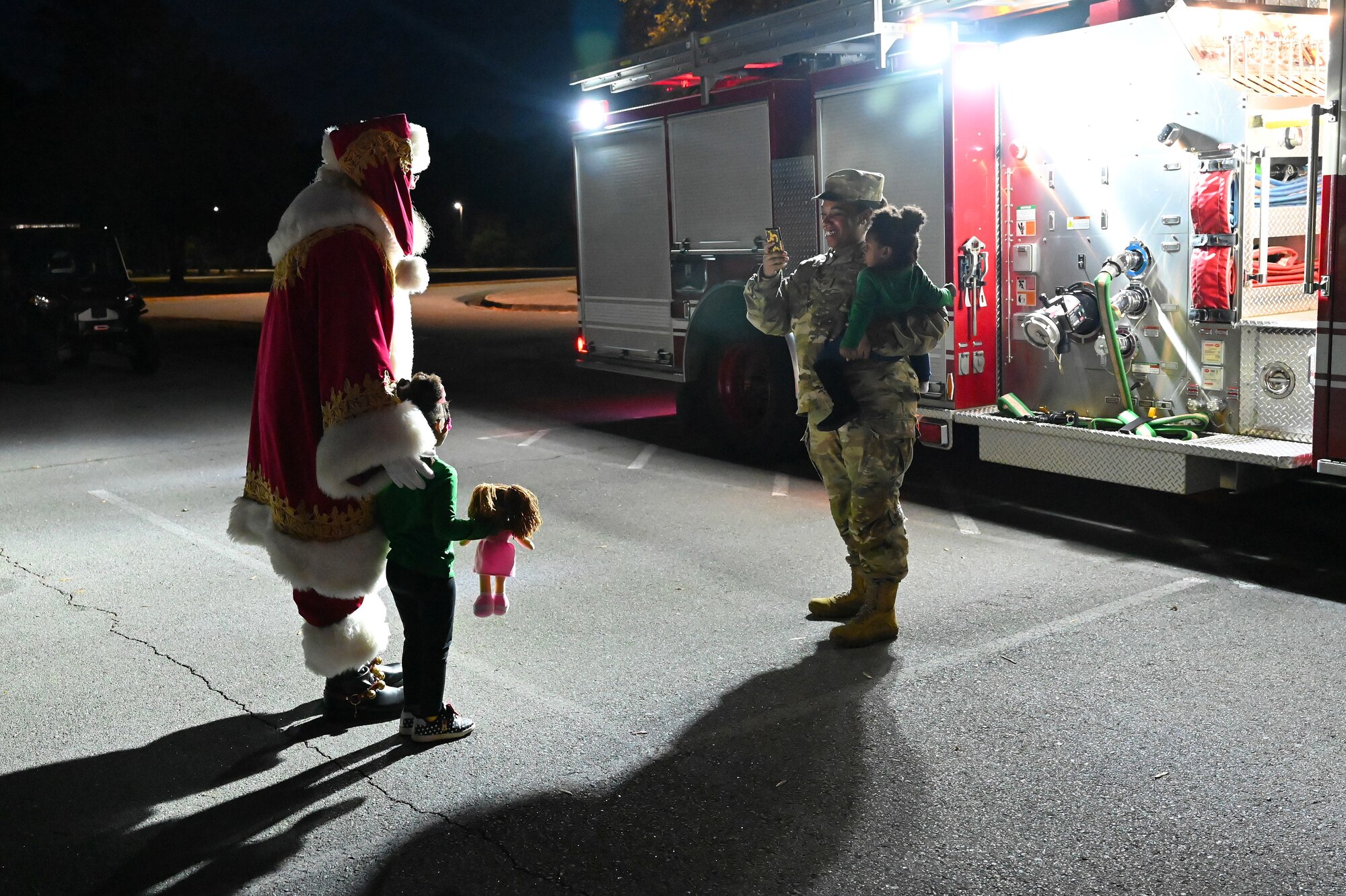 Families enjoy the Holiday Tree lighting ceremony in Heritage Park