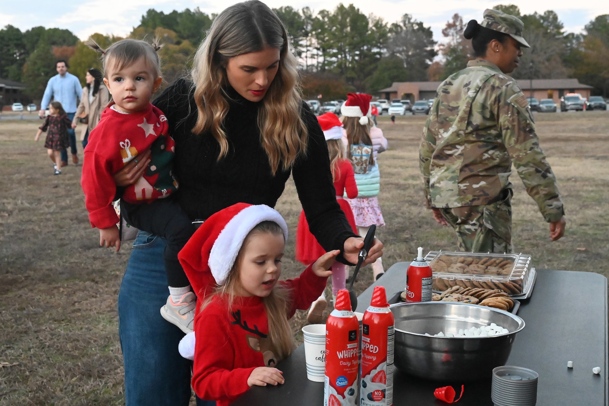 Families enjoy the Holiday Tree lighting ceremony in Heritage Park