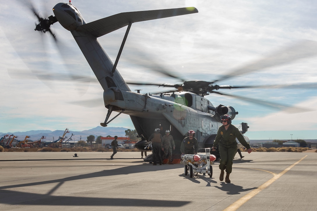 U.S. Marines with the 3rd Marine Aircraft Wing All Type Model Series Armament Team and Marine
Heavy Helicopter Squadron (HMH) 361, Marine Aircraft Group 16, 3 rd MAW, conduct a node resupply in
support of Exercise Steel Knight 23.2 at Inyokern Airfield, California, Dec. 2, 2023.  The resupply provided
materials to a forward arming and refueling point to keep aircraft response-ready and extend their
combat range. Steel Knight 23.2 is a three-phase exercise designed to train I Marine Expeditionary Force
in the planning, deployment and command and control of a joint force against a peer or near-peer
adversary combat force and enhance existing live-fire and maneuver capabilities of the Marine Air-
Ground Task Force. (U.S. Marine Corps photo by Lance Cpl. Alexis Ibarra)