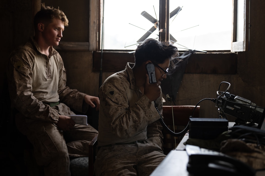 U.S. Marine Corps Lance Cpl. Hunter Young, left, and Sgt. Peter Montalvo, both radio operators with Fox Company, 2nd Battalion, 5th Marine Regiment, 1st Marine Division, perform a communications check for a simulated embassy reinforcement during a mission rehearsal exercise as part of Exercise Steel Knight 23.2 at Marine Corps Base Camp Pendleton, California, Nov. 29, 2023. Steel Knight maintains and sharpens I Marine Expeditionary Force as America’s expeditionary force in readiness – organized, trained and equipped to respond to any crisis, anytime, anywhere. This exercise will certify 5th Marines to be forward-postured in Australia as Marine Rotational Force - Darwin, a six-month deployment during which Marines train with Australian allies and facilitate rapid response to crises and contingencies. Young is a native of DeFuniak Springs, Florida. Montalvo is a native of Albuquerque, New Mexico. (U.S. Marine Corps photo by Cpl. Earik Barton)