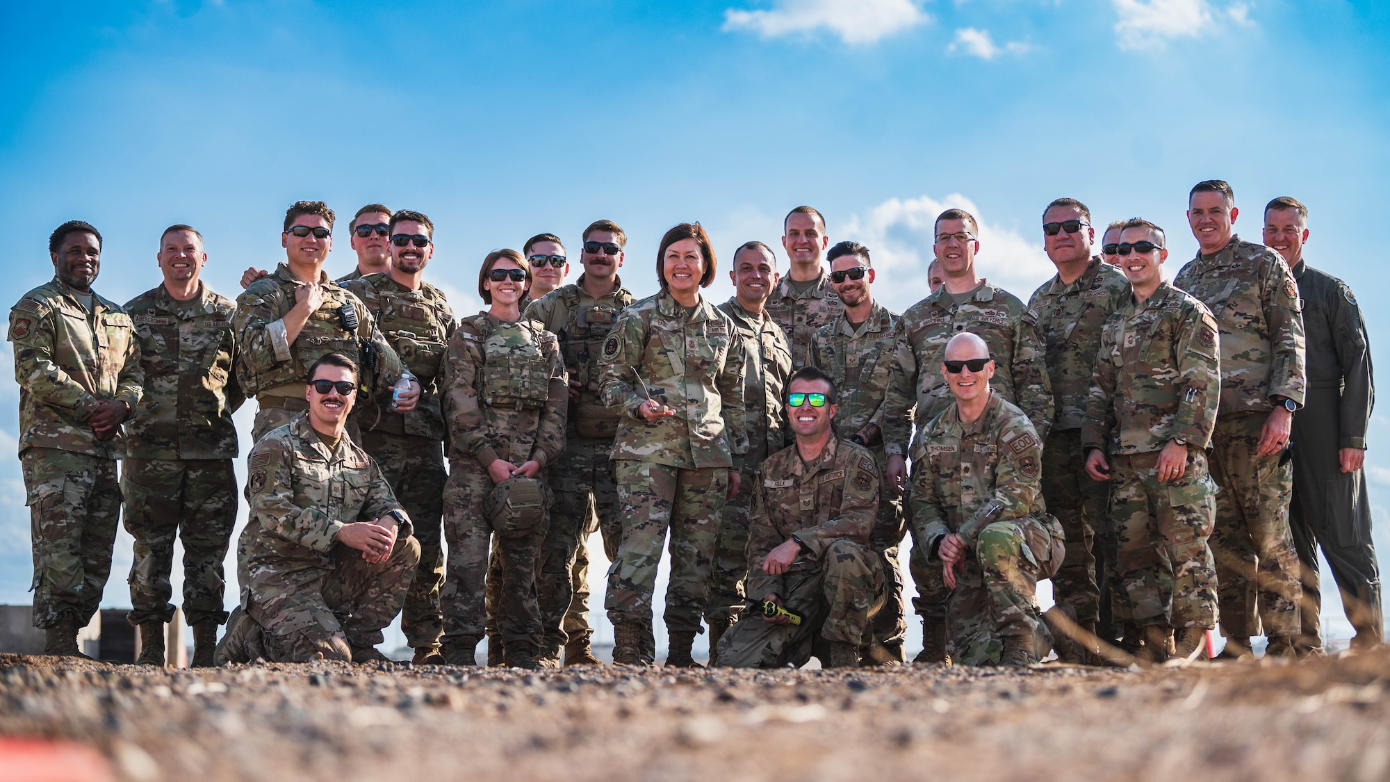 Chief Master Sgt. of the Air Force Joanne Bass poses for a photo with 56th Civil Engineer Squadron Airmen.