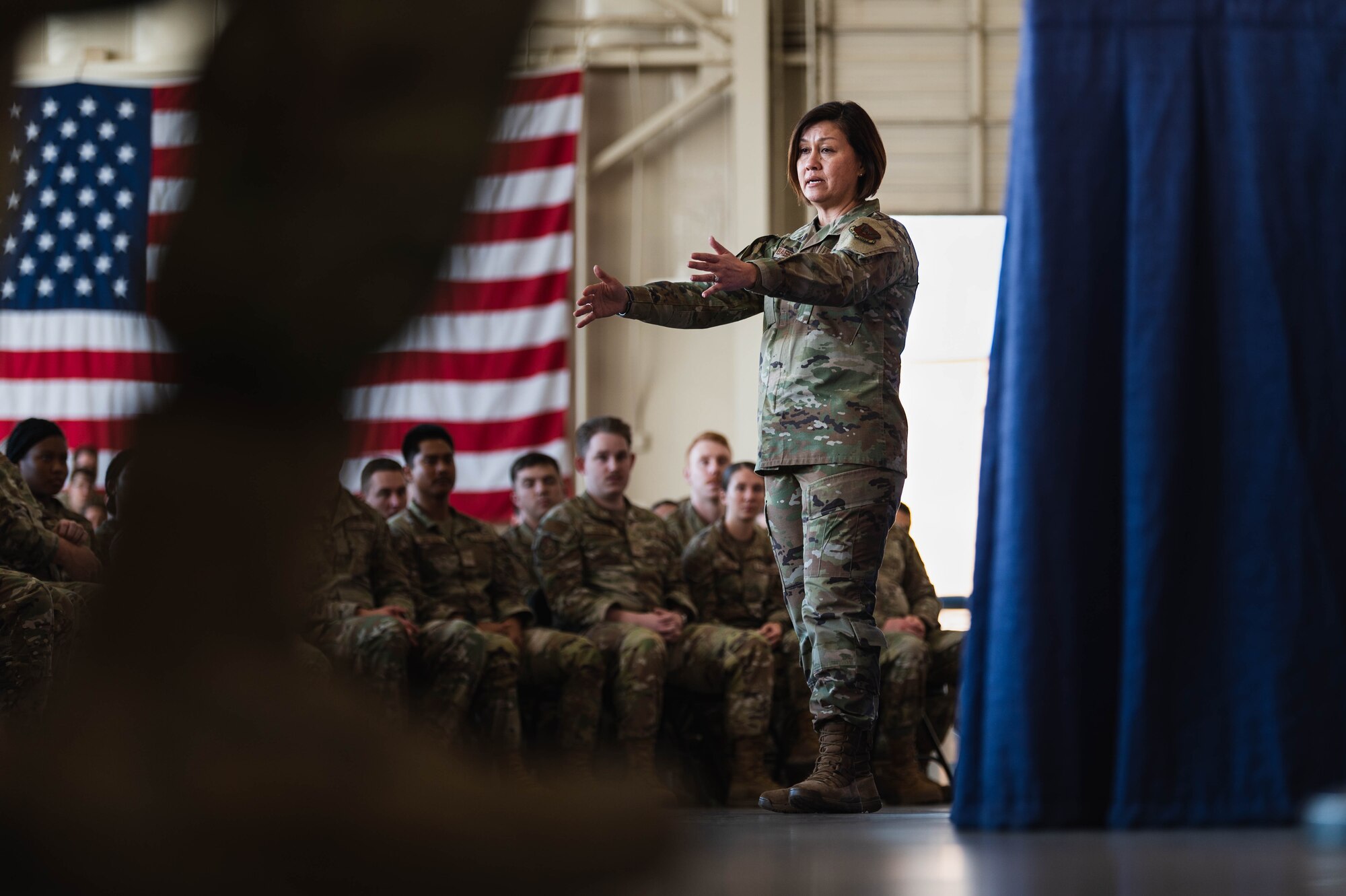 Chief Master Sgt. of the Air Force Joanne Bass engages with Airmen from the 56th Fighter Wing during a base all-call
