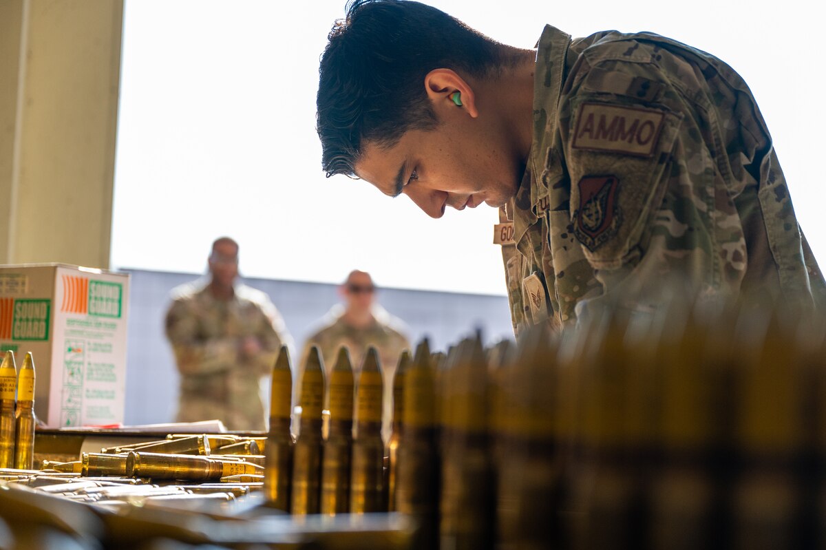 Staff Sgt. Christopher Gonzalez, 8th Maintenance Squadron conventional maintenance crew chief, sorts through 20 mm rounds