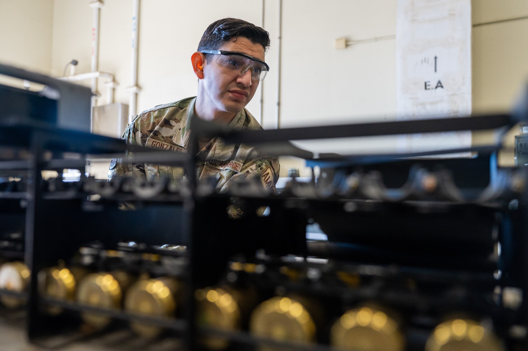 Staff Sgt. Christopher Gonzalez, 8th Maintenance Squadron conventional maintenance crew chief, downloads 20 mm rounds