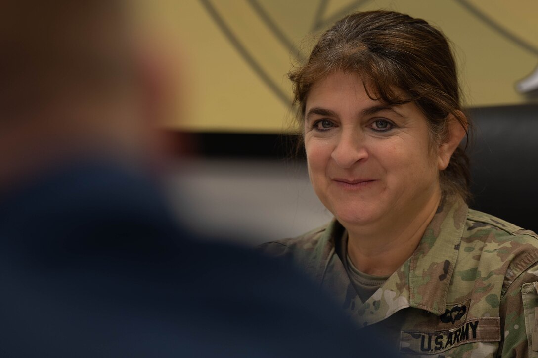 U.S. Army Maj. Gen. Kris Belanger, 99th Readiness Division commanding general, listens to an induction brief at Joint Base McGuire-Dix-Lakehurst, N.J., Nov. 20, 2023. JB MDL conducted a tour for Belanger on Fort Dix as a part of her introduction of the base. (U.S. Air Force photo by Airman 1st Class Aidan Thompson)