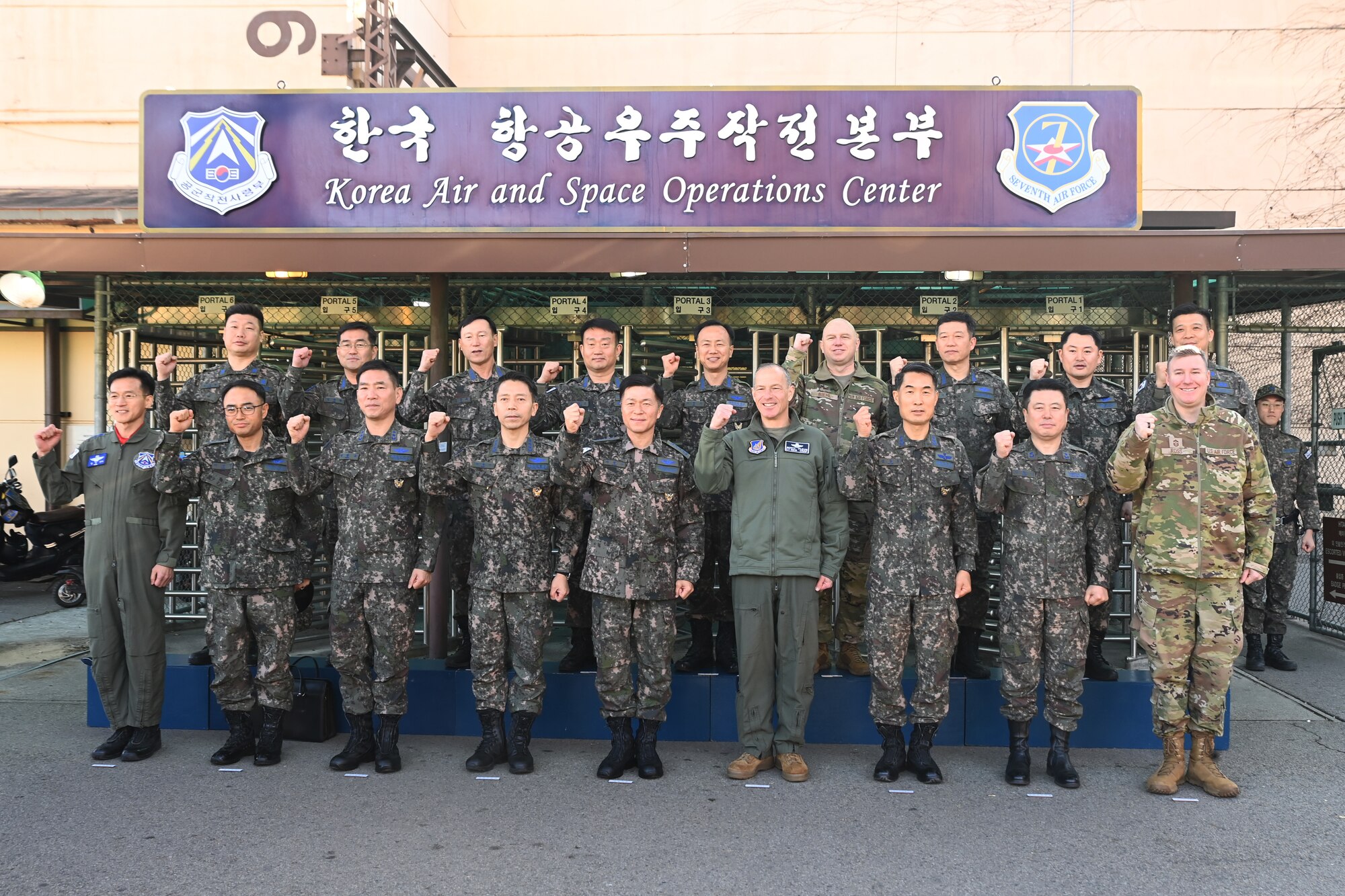 Republic of Korea Air Force Chief of Staff, Gen. Lee, Young Su, right, listens to a briefing in the 607th Air Operations Center at Osan Air Base, ROK, Dec. 4, 2023.