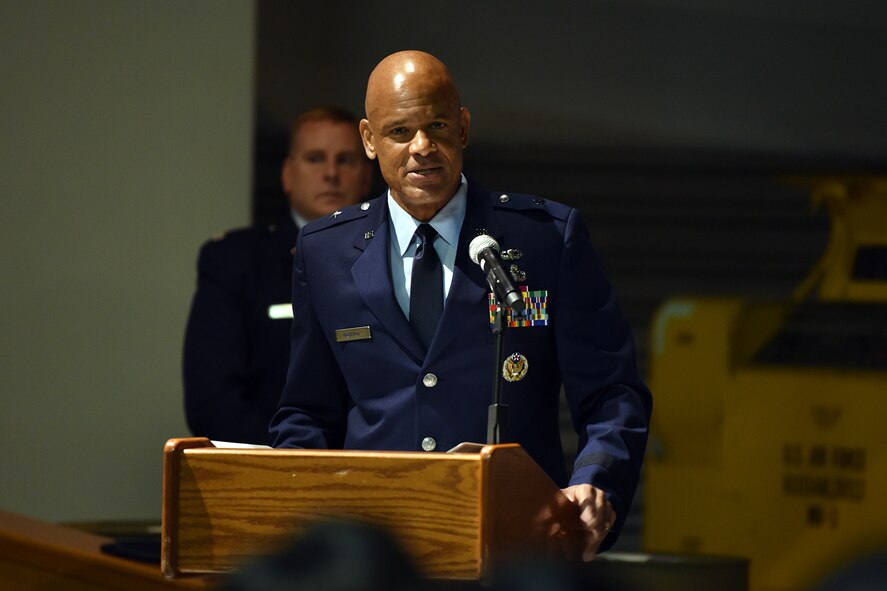 Photo of Brig. Gen. Kelvin McElroy speaking behind a podium.