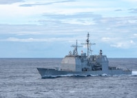 ATLANTIC OCEAN (Nov. 2, 2022)  The Ticonderoga-Class Guided-Missile Cruiser, USS Normandy (CG 60) steams alongside USS Gerald R. Ford (CVN 78) before a replenishment at sea, Nov. 2. The Gerald R. Ford Carrier Strike Group (GRFCSG) is deployed in the Atlantic Ocean, conducting training and operations alongside NATO Allies and partners to enhance integration for future operations and demonstrate the U.S. Navy's commitment to a peaceful, stable and conflict-free Atlantic region. (U.S. Navy Photo by Mass Communication Specialist 1st Class Ryan Seelbach)