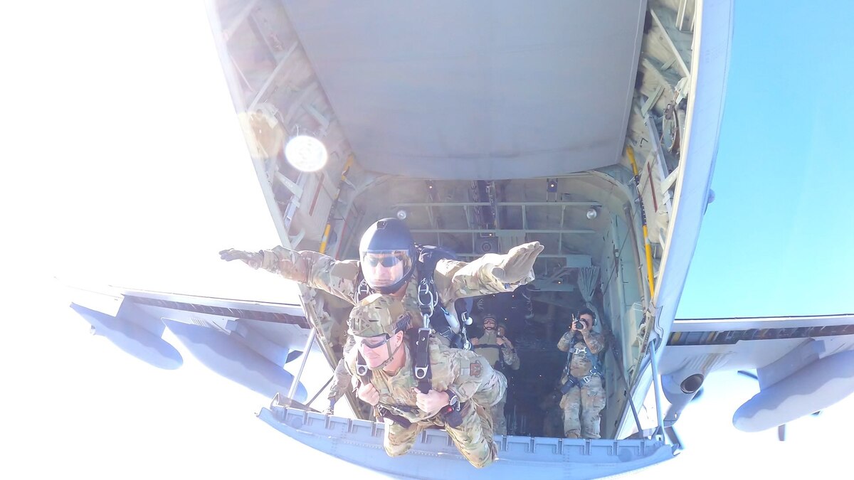 Lt. Gen. John Healy and Senior Master Sgt. Matthew Williams take part in a tandem parachute jump at Patrick Space Force Base, Florida. (Master Sgt. Richard Dunn)