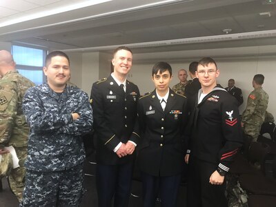 Joe Tincher and Kayla Colfax, center, are pictured when the couple were still in uniform. The former Soldiers married while serving in Korea and continue to serve together as civilian biomedical equipment technicians at the U.S. Army Medical Materiel Agency’s Medical Maintenance Operations Division at Hill Air Force Base, Utah. MMOD-Hill was their last duty station in uniform before transitioning to civilian service in recent years. (Courtesy Kayla Colfax)