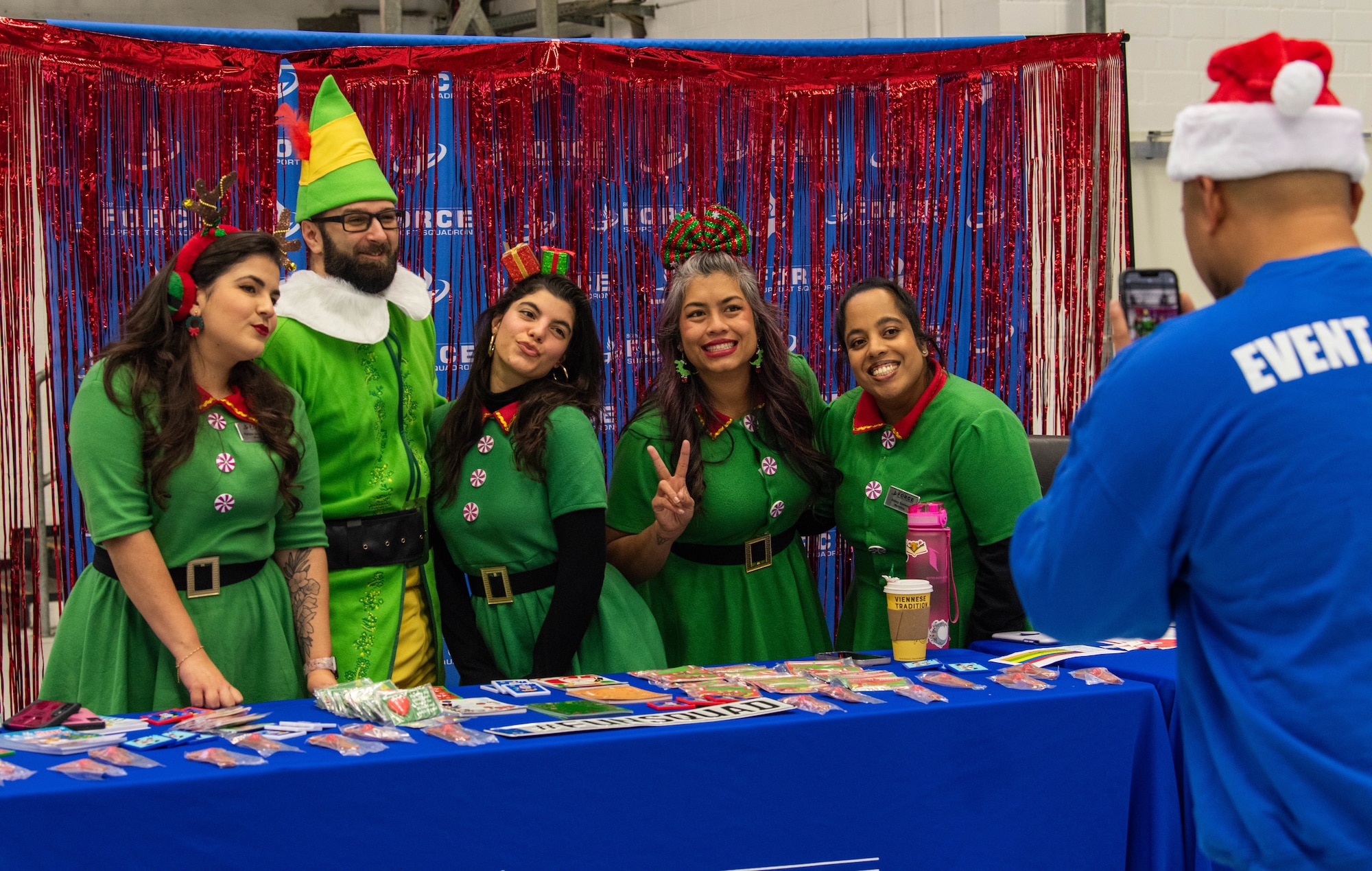 Volunteers smile for photo.