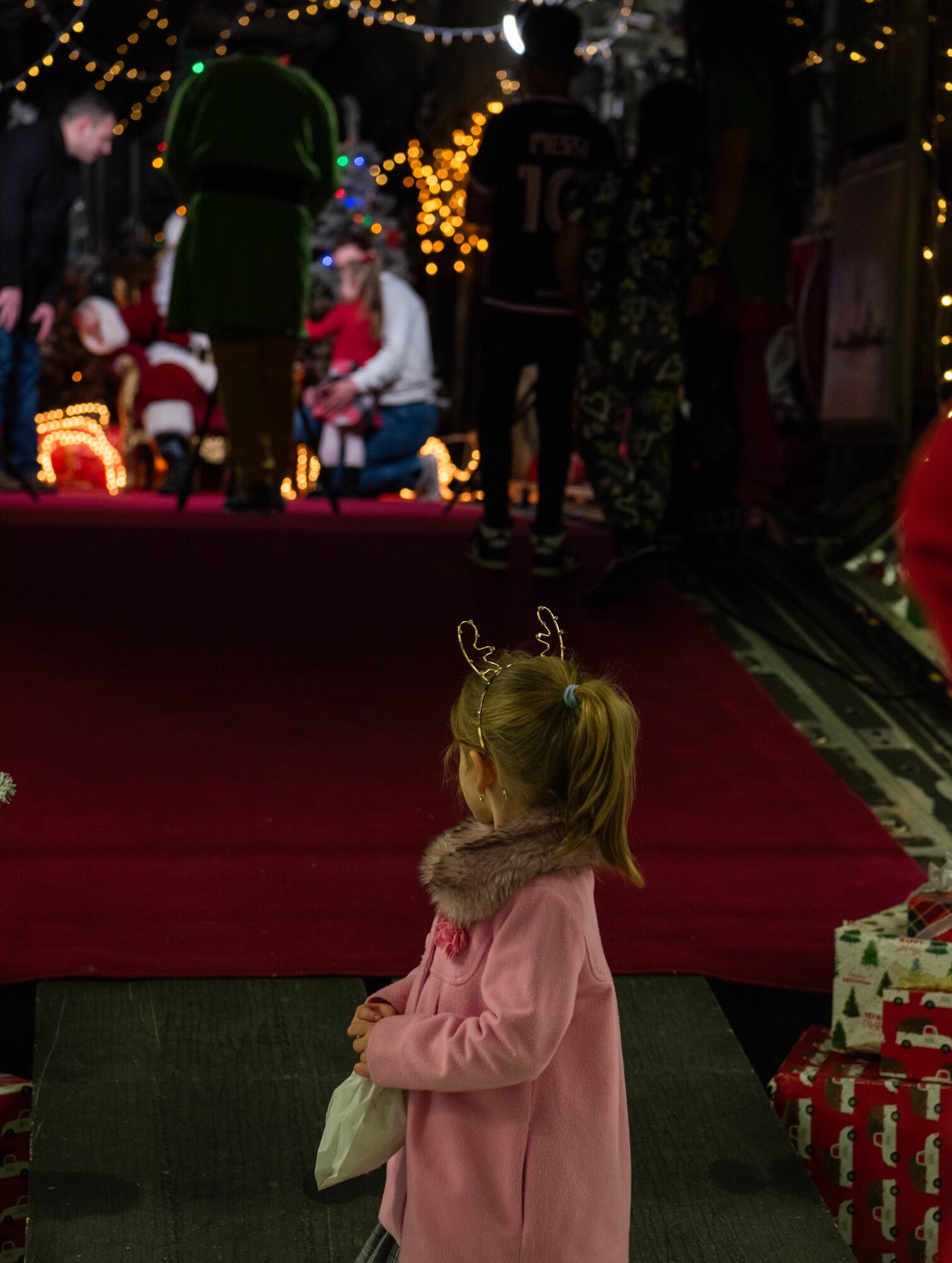 Child waits to see Santa Claus.