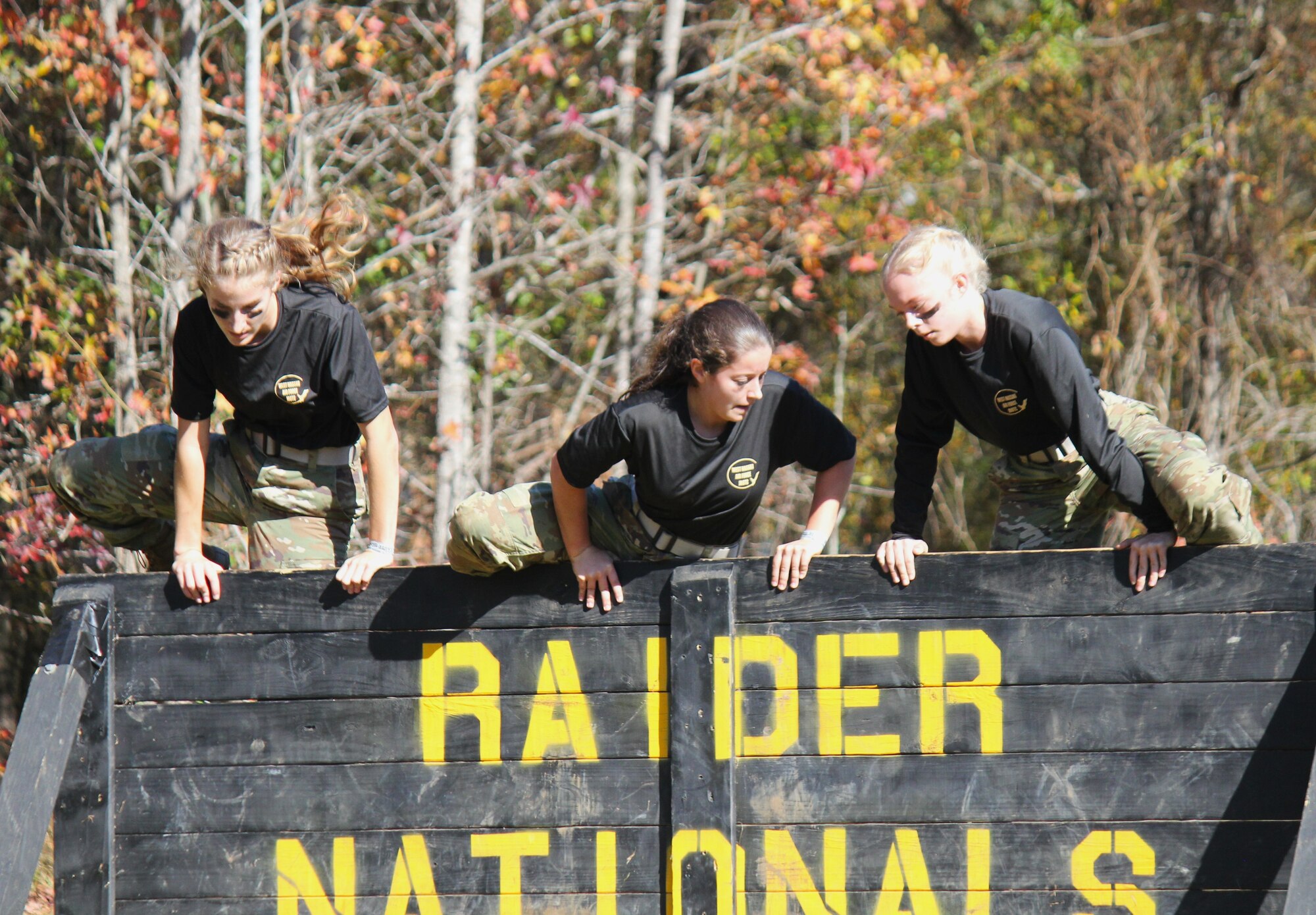 An Air Force Junior ROTC cadet competes in the Rope Bridge event.