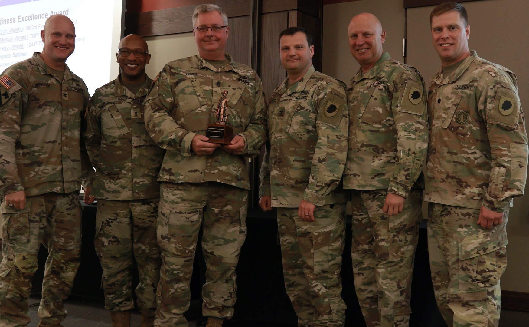 Illinois Army National Guard Command Sgt. Maj. Greg Jones of Port Byron, Illinois, was awarded the Meritorious Service Medal for his work as the senior noncommissioned officer of the Peoria-based 65th Troop Command Brigade.