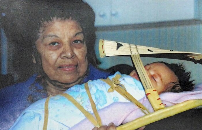 U.S. Air Force Tech. Sgt. Brady Pemberton pictured as an infant with his great grandmother in 1996 in Grass Valley, California.