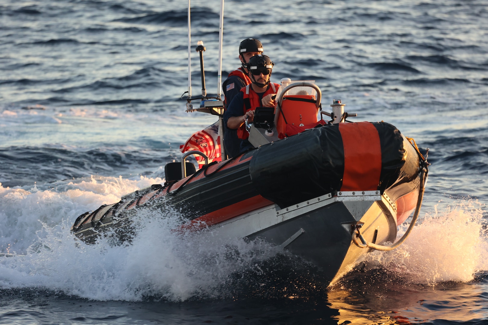 U.S. Coast Guard Petty Officer 1st Class Ryan Keegan, front, and Petty Officer 1st Class Spencer Rood, back, both assigned to U.S. Coast Guard Cutter Tahoma (WMEC 908) conduct small boat operations with the cutter boat large in the Florida Straits, Nov. 6, 2023. Tahoma deployed for a 65-day patrol and conducted maritime safety and security missions while supporting Homeland Security Task Force – Southeast.