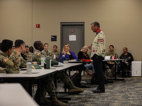 Retired U.S. Army Col. John McCarthy speaks as spouse of U.S. Army Reserve commander