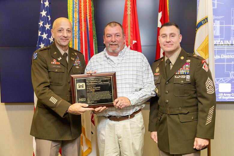 U.S. Army Corps of Engineers Chief of Engineers and Commanding General Lt. Gen Scott Spellmon presented Brian Ragsdale, St. Louis District Dredge Potter master with the 2023 Chief of Engineers Operations and Maintenance Castle Award during the 2023 National Awards Ceremony at the Corps of Engineers headquarters in Washington, D.C., Nov. 29, 2023.