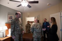 U.S. Air Force Col. Michael  Freeman, 628th Air Base Wing commander, takes a tour of the new temporary lodging facility on Joint Base Charleston, South Carolina.