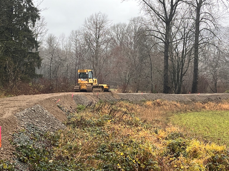 Crews raise a threatened levee near Hamilton, Washington, December 5, 2023. USACE is providing direct flood assistance to the City of Hamilton and work began Monday evening to temporarily raise a threatened levee. (U.S. Army photo by Kimberly Lopes)