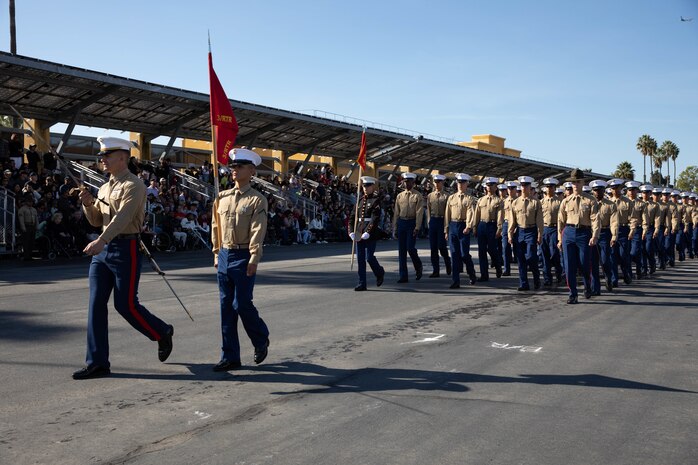 U.S. Marines with Kilo Company, 3rd Recruit Training Battalion, march in formation during their graduation ceremony at Marine Corps Recruit Depot San Diego, Dec. 1, 2023. Graduation took place at the completion of the 13-week transformation, which included training for drill, marksmanship, basic combat skills, and Marine Corps customs and traditions. (U.S. Marine Corps photo by Lance Cpl. Sarah M. Grawcock)