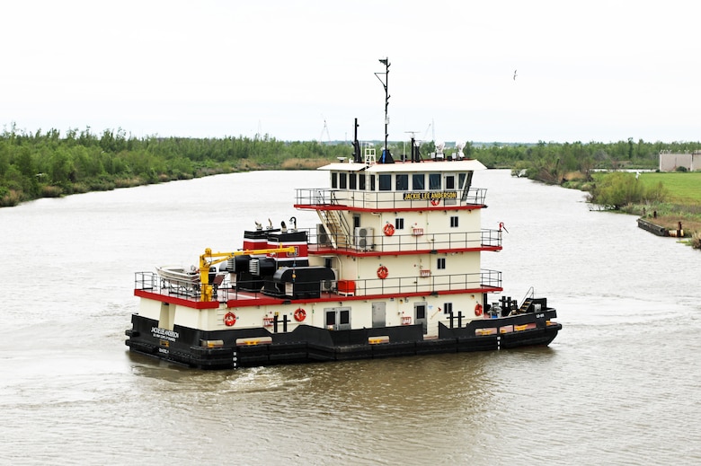 Photo shows a towboat operating in the water