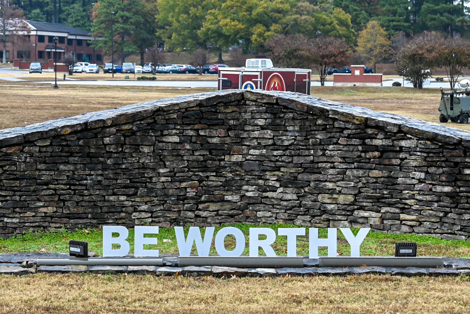 A "Be Worthy” sign is displayed in Heritage Park.