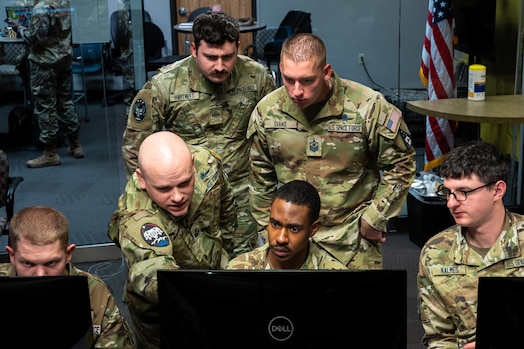 U.S. Space Force Guardians participate in Moonlighter, an exercise designed to focus on refining the defensive and offensive skill sets of these Guardians, centered around the Moonlighter imaging satellite, in Colorado Springs, Colorado, Nov. 15, 2023, The Moonlighter imaging satellite, a 3U CubeSat, serves as an exclusive on-orbit cyber test platform. Its role includes facilitating defensive cyber operations and refining cyber-related tactics, techniques, and procedures.(U.S. Space Force photo by Ethan Johnson)
