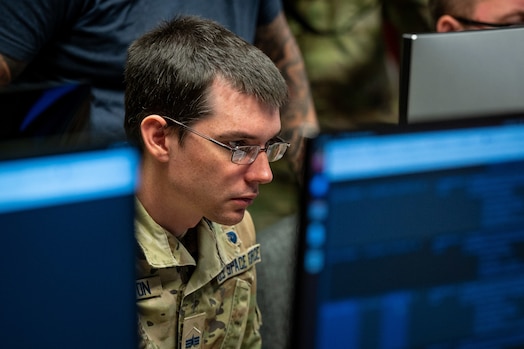  A U.S. Space Force Guardian participates in Moonlighter, an exercise designed to focus on refining the defensive and offensive skill sets of Cyber Guardians, centered around the Moonlighter imaging satellite, in Colorado Springs, Colorado, Nov. 15, 2023, The Moonlighter imaging satellite, a 3U CubeSat, serves as an exclusive on-orbit cyber test platform. Its role includes facilitating defensive cyber operations and refining cyber-related tactics, techniques, and procedures.(U.S. Space Force photo by Ethan Johnson)