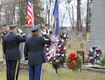 New York Army National Guard Maj. Gen. Michel Natali and  Command Sgt. Maj. Edwin Garris salute after placing a wreath from the White House marking the birthday of former President Martin Van Buren in Kinderhook, New York, Dec. 5, 2023. Natali presented a wreath from President Joseph Biden at the annual ceremony held at Van Buren’s gravesite in Kinderhook Reformed Cemetery.