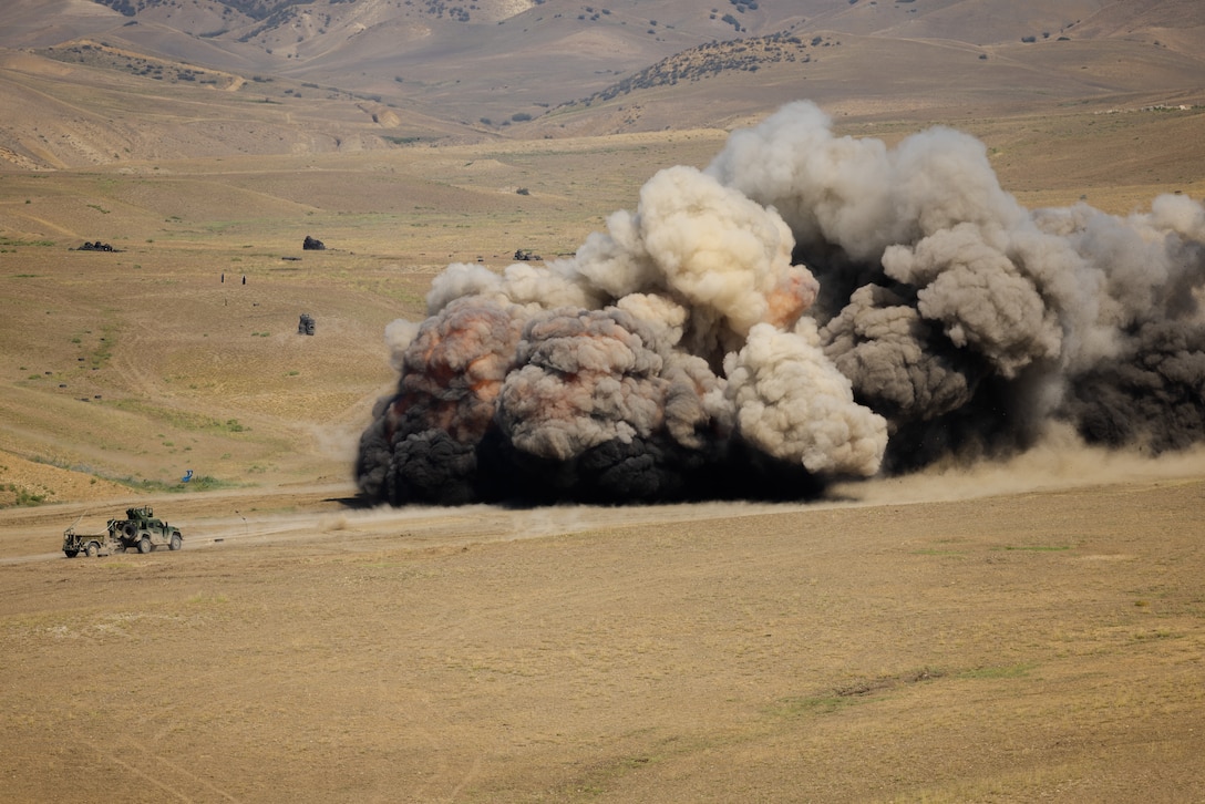 U.S. Marines with the 2nd Combat Engineer Battalion, 2nd Marine Division, detonate breaching chord deployed by a Medium-Range Intercept Capability (MRIC) missile during exercise Agile Spirit 23 in Vaziani Training Area, Georgia on Sep. 1, 2023. Exercise Agile Spirit 23 is designed to support theater security cooperation and interoperability among NATO Allies and partners to improve joint and multinational readiness, scale, and capabilities by exercising rapid mobility and posture combat credible forces across the European theater to the country of Georgia to bolster their defense efforts and deter aggression in the Black Sea region while exercising the enduring U.S. State Partnership Program with the Georgia Army National Guard. (U.S. Marine Corps photo by Cpl. Christopher Doughty)