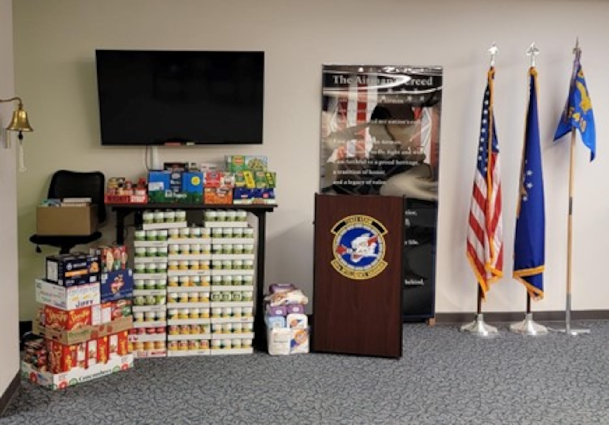 For the third year in a row, members of the 64th Intelligence Squadron (IS) conducted a two-month-long food drive that culminated in 760 pounds of food (pictured) being delivered to Dayton-based Hearth Community Place Food Pantry at the end of November. The squadron conducts community impact activities such as this throughout the year to support local families. (Courtesy Photo)