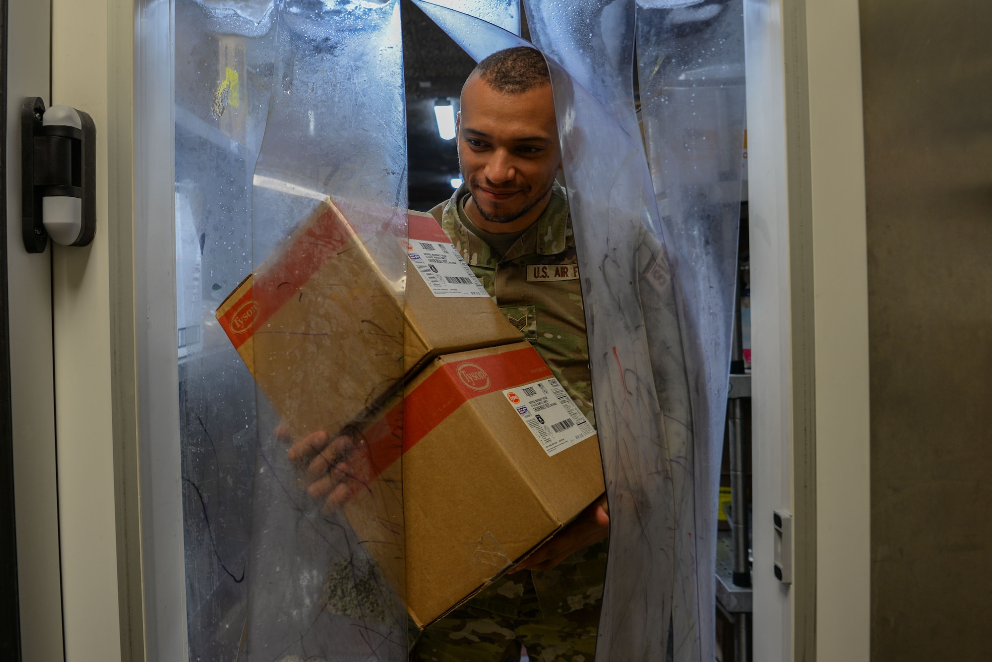 Person carrying boxes
