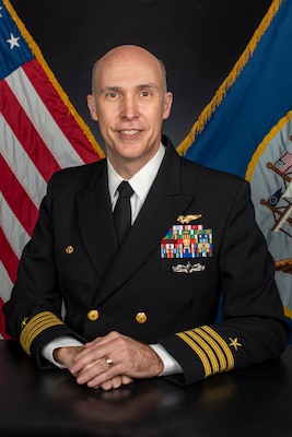 Official studio photo of Capt. Thomas Lovett, Chief of Staff, Carrier Strike Group (CSG) 8