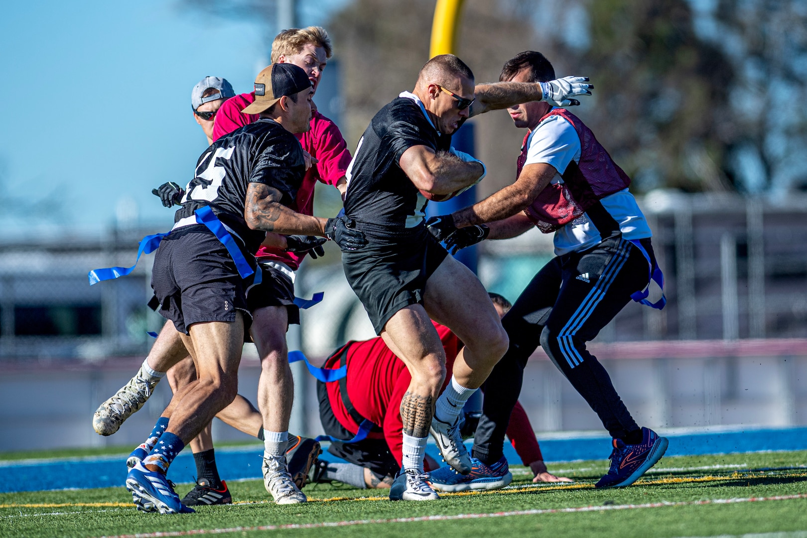 Men playing flag football