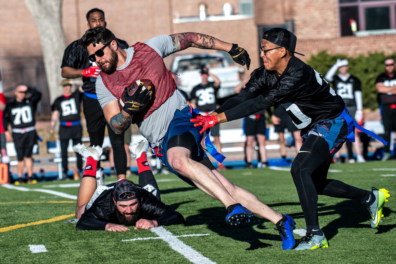 Man running with football